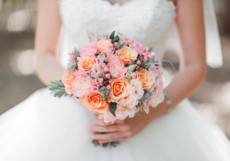Bride holding wedding bouquet